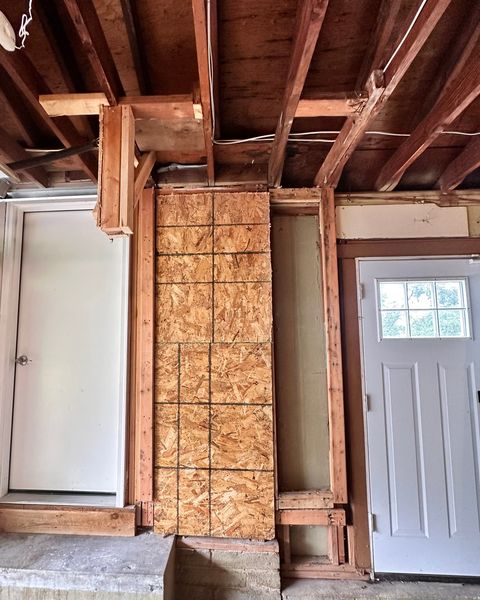 Day 2: the same wall the next day with new sheathing in place, Overland Park, KS